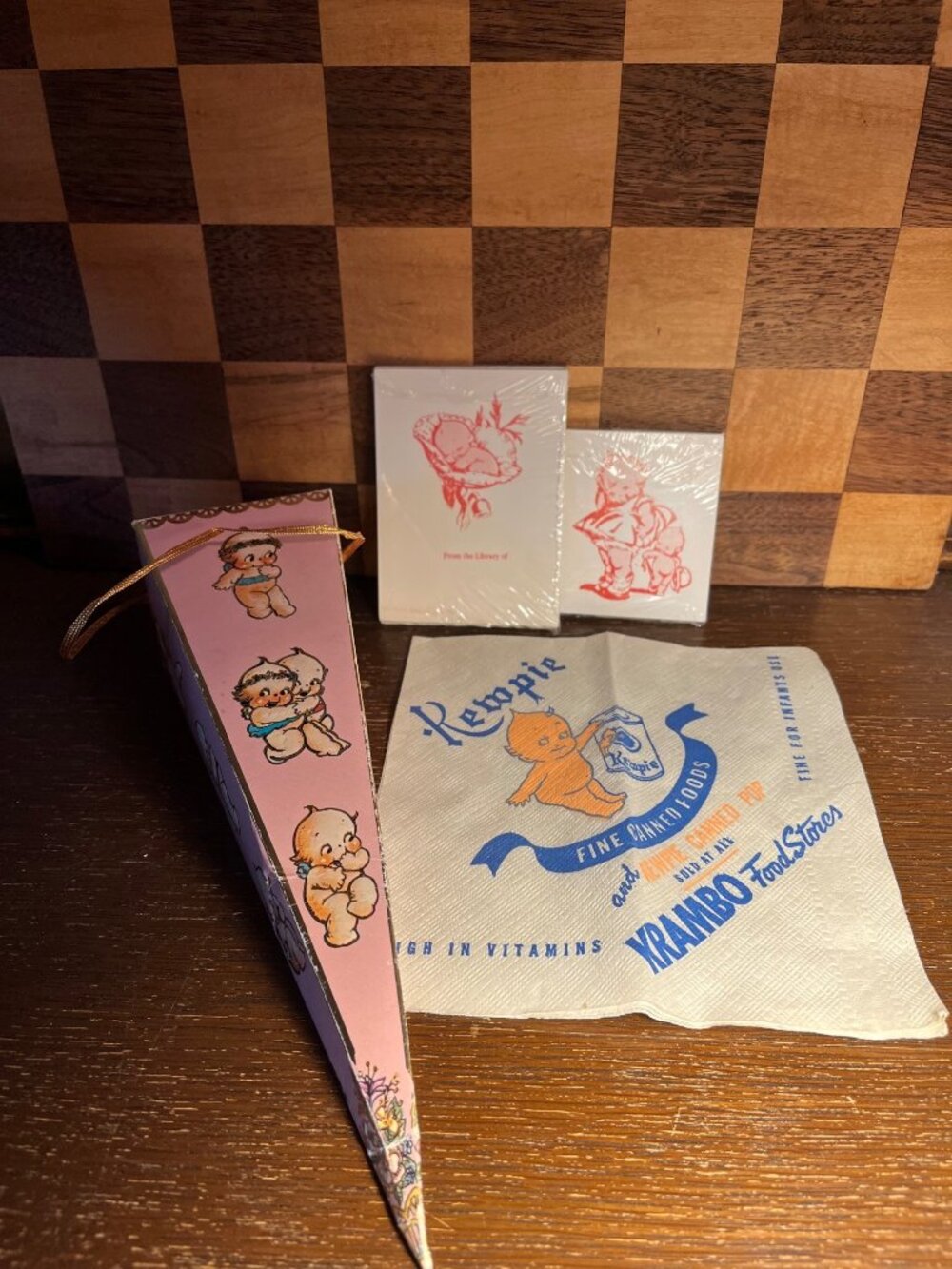 Kewpie Box (shows wear), Wisconsin Krambo Supermarket Napkin, Book and Gift Encl